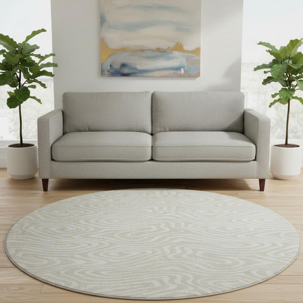 HomeRoots 8' Beige and Ivory Abstract Round Washable Rug - Stain Resistant, UV Protected for High Traffic Areas 680064