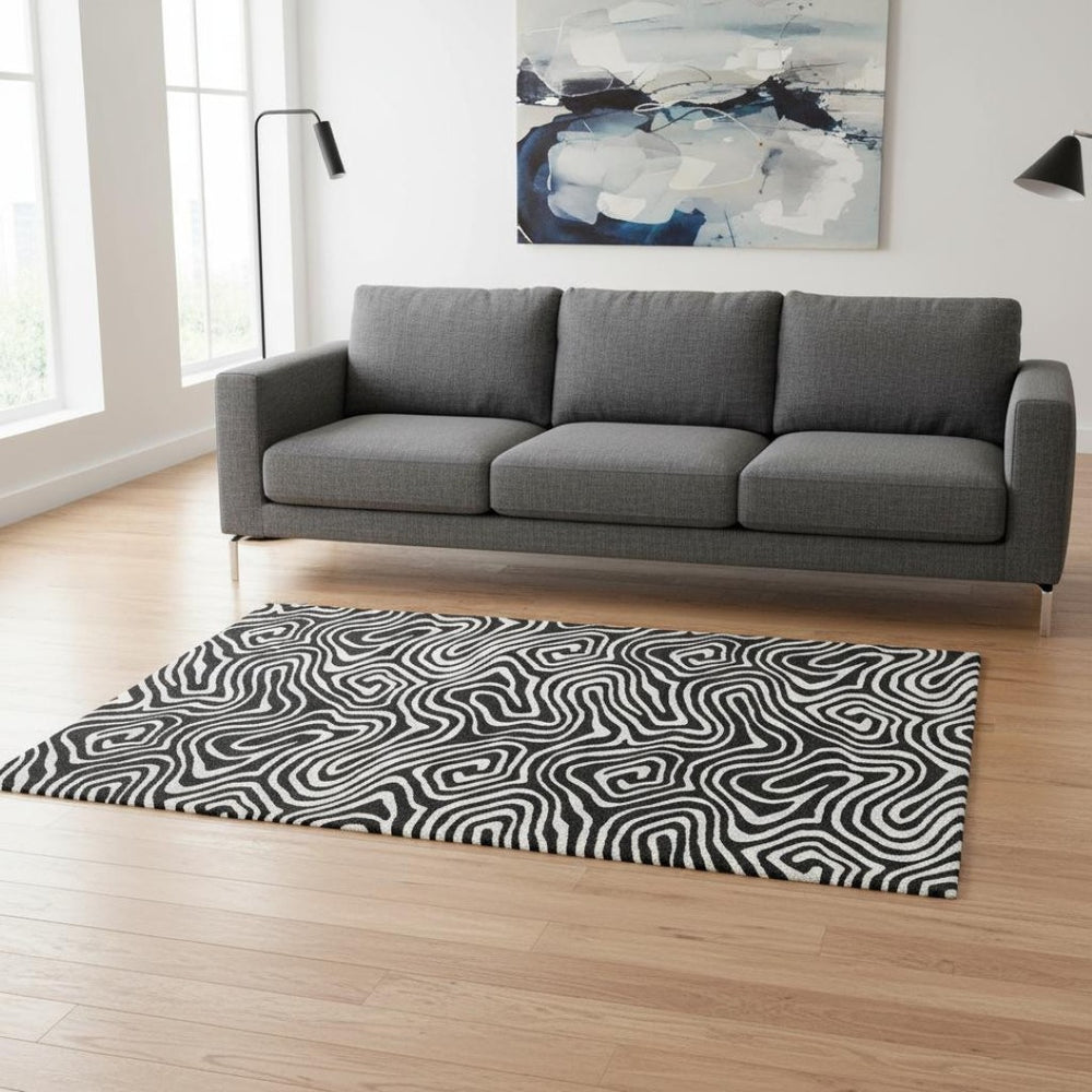 HomeRoots 5' X 8' Black And Ivory Abstract Area Rug – Washable, UV Protection, Ideal for Modern Homes & Pets 680069