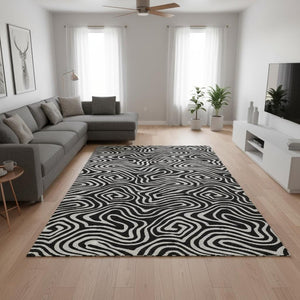 HomeRoots 8' X 10' Black And Ivory Abstract Area Rug – Washable, UV Protected, Durable Design for Modern Spaces 680071