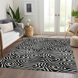 HomeRoots 8' X 10' Black And Ivory Abstract Area Rug – Washable, UV Protected, Durable Design for Modern Spaces 680071