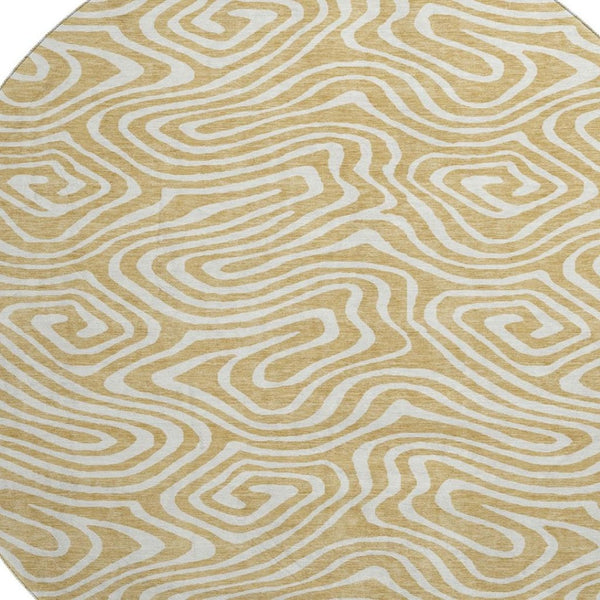 HomeRoots 8' Gold and Ivory Abstract Round Rug - Washable, UV-Protected, and Perfect for Stylish Spaces 680082