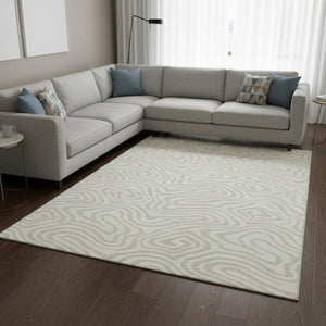 HomeRoots 8' X 10' Ivory and Beige Abstract Area Rug - Washable, UV Protected, Stain Resistant for Busy Homes 680095