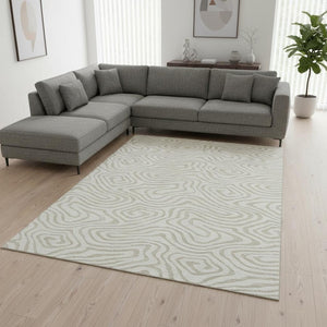 HomeRoots 9' X 12' Ivory and Beige Abstract Area Rug – Durable, Washable, UV-Protected for High-Traffic Spaces 680096