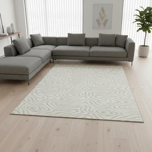 HomeRoots 10' X 14' Elegant Ivory and Beige Abstract Area Rug - Washable, UV Protected, Perfect for Busy Homes 680097