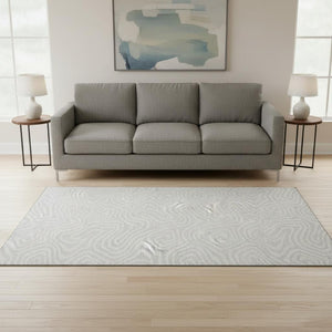 HomeRoots 5' X 8' Stylish Silver and Ivory Abstract Area Rug - Stain Resistant, UV Protected, Family-Friendly Decor 680129