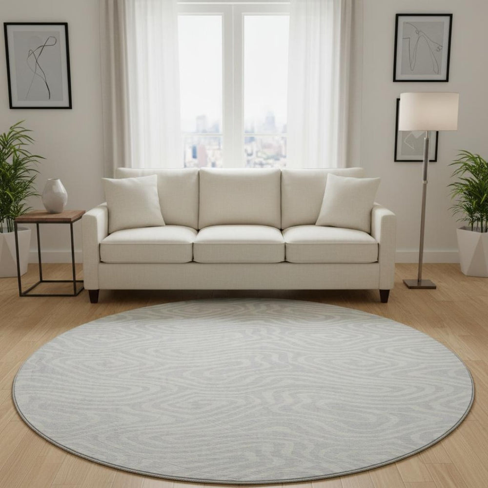 HomeRoots 8' Silver and Ivory Abstract Washable Round Rug - Durable, UV-Protected, Perfect for Busy Homes! 680130