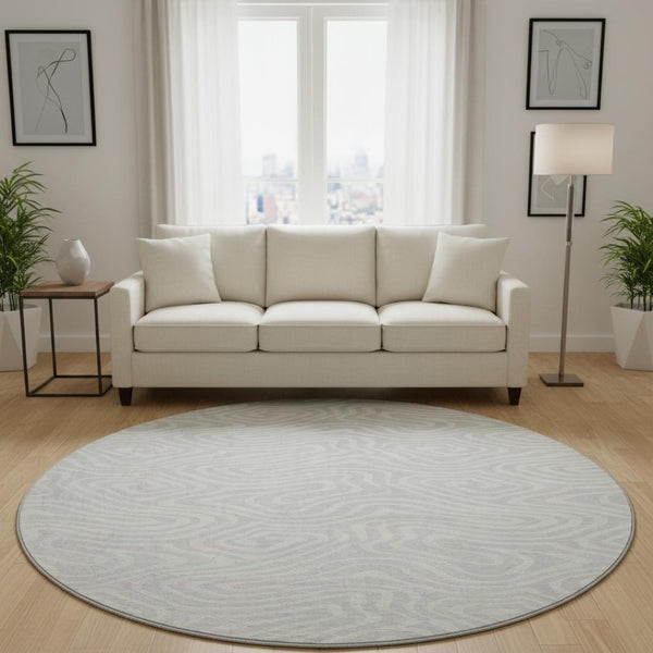 HomeRoots 8' Silver and Ivory Abstract Washable Round Rug - Durable, UV-Protected, Perfect for Busy Homes! 680130