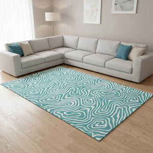 HomeRoots 8' X 10' Teal and Ivory Abstract Area Rug – Washable, UV Protected, Perfect for High-Traffic Spaces! 680137