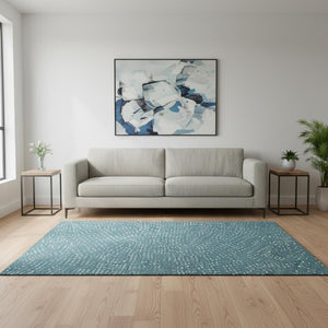 HomeRoots 5' X 8' Teal and Ivory Polka Dot Area Rug - Washable, UV Protected, Perfect for Homes with Kids & Pets 680207