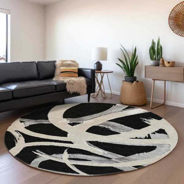 HomeRoots 8' Modern Abstract Black, Ivory & Gray Washable Round Rug with UV Protection for High-Traffic Areas 680232