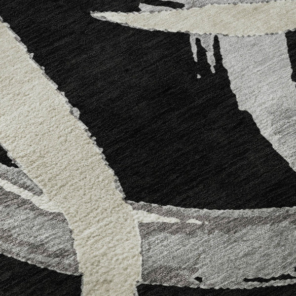HomeRoots 8' Modern Abstract Black, Ivory & Gray Washable Round Rug with UV Protection for High-Traffic Areas 680232