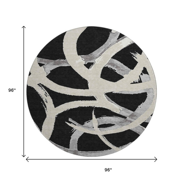 HomeRoots 8' Modern Abstract Black, Ivory & Gray Washable Round Rug with UV Protection for High-Traffic Areas 680232