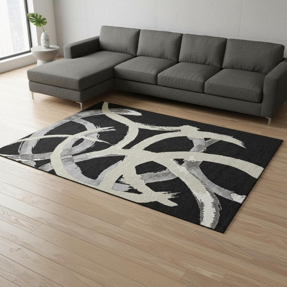 HomeRoots 8' X 10' Washable Black Ivory Gray Abstract Area Rug with UV Protection for Family-Friendly Spaces 680233