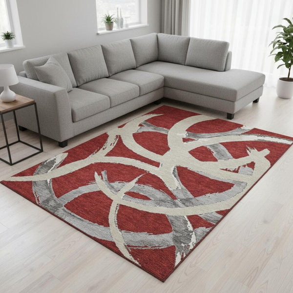 HomeRoots 9' X 12' Modern Red Ivory and Gray Abstract Area Rug – Washable, UV Protected, Stain Resistant Design 680288