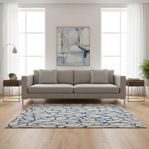HomeRoots 5' X 8' Beige and Navy Blue Geometric Area Rug - Washable, UV-Protected, Pet-Friendly Design! 680297