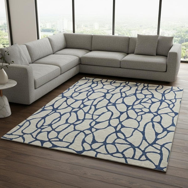 HomeRoots 8' X 10' Stylish Beige & Navy Blue Geometric Washable Area Rug with UV Protection for High-Traffic Spaces 680299