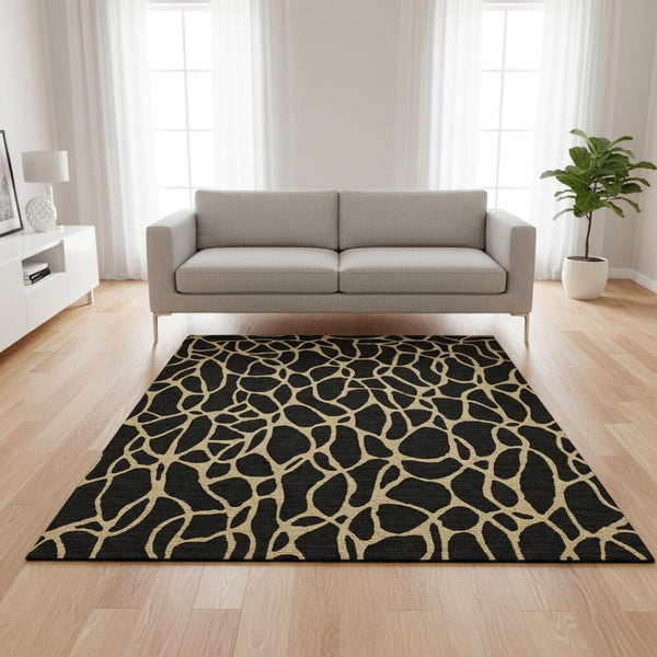 HomeRoots 5' X 8' Black And Gold Geometric Area Rug - Washable, UV Protected, Durable & Stylish for Any Room 680303