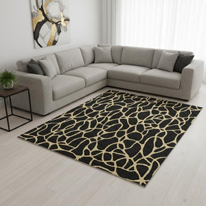 HomeRoots 8' X 10' Black and Gold Geometric Washable Area Rug with UV Protection - Durable, Stylish & Easy Care! 680305