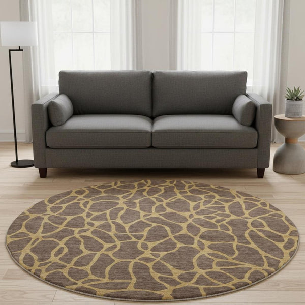 HomeRoots 8' Brown and Gold Geometric Round Rug - Washable, UV Protected, Durable, Perfect for Modern Spaces 680310