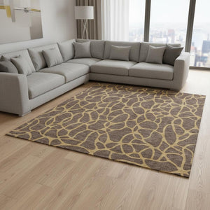 HomeRoots 9' X 12' Brown and Gold Geometric Area Rug - Washable, Stain-Resistant with UV Protection for Homes 680312