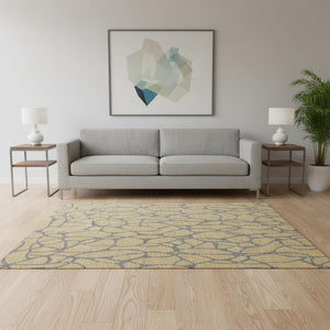 HomeRoots 5' X 8' Gold and Gray Geometric Area Rug – Washable, UV Protected, Soft Polyester for Busy Homes 680315
