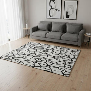 HomeRoots 5' x 8' Ivory and Black Geometric Washable Area Rug – Stylish, Durable, UV-Protected for Modern Homes 680327