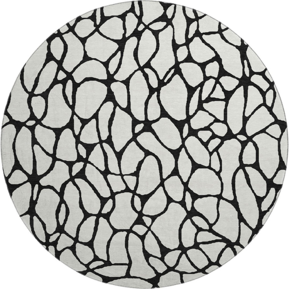 HomeRoots 8' Ivory and Black Geometric Round Rug - Washable, UV Protected, Durable Design for Busy Homes 680328