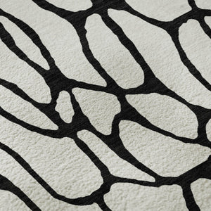 HomeRoots 8' Ivory and Black Geometric Round Rug - Washable, UV Protected, Durable Design for Busy Homes 680328