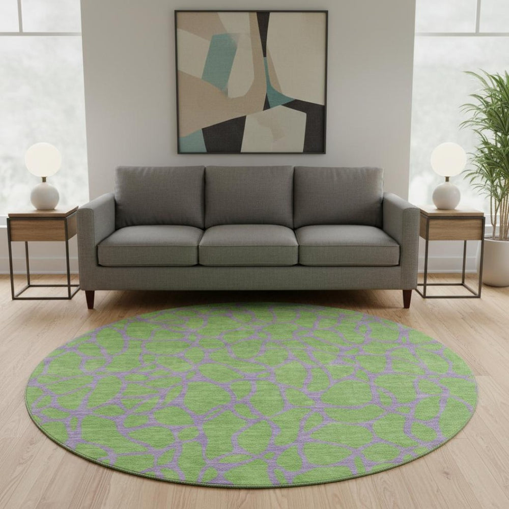 HomeRoots 8' Vibrant Lime Green & Purple Geometric Washable Round Rug with UV Protection for Indoor & Outdoor Spaces 680334