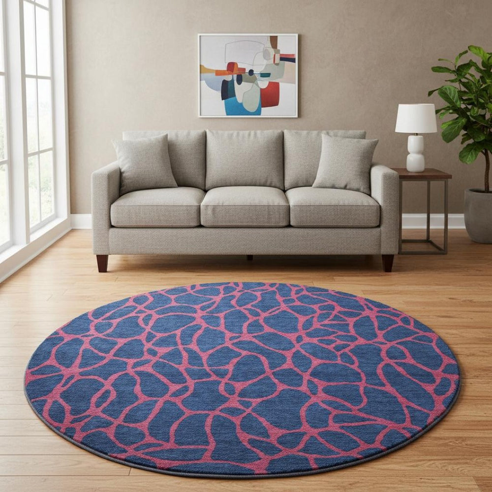 HomeRoots 8' Stylish Navy Blue & Pink Geometric Washable Round Rug with UV Protection for Modern Spaces 680346