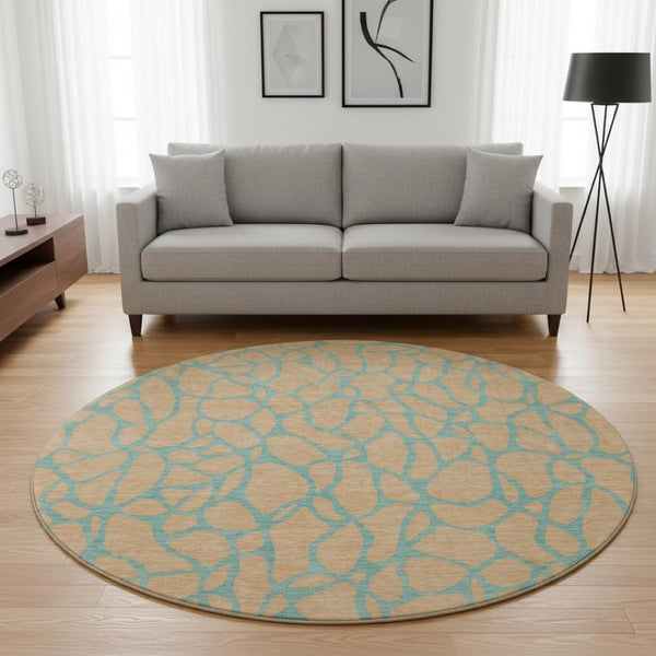 HomeRoots 8' Peach and Teal Geometric Round Rug - Washable, UV-Protected, Perfect for Kids and Pets! 680352