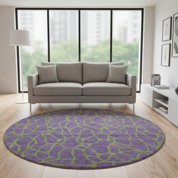 HomeRoots 8' Bold Purple and Green Geometric Washable Round Rug with UV Protection for Modern Homes 680358