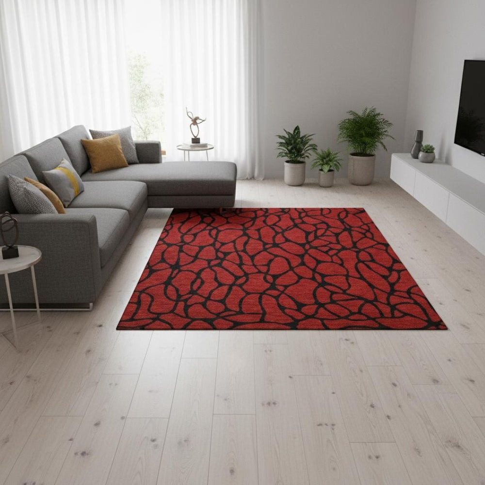 HomeRoots 5' X 8' Red and Black Geometric Area Rug - Washable, UV Protected, Stain Resistant for Modern Living 680363