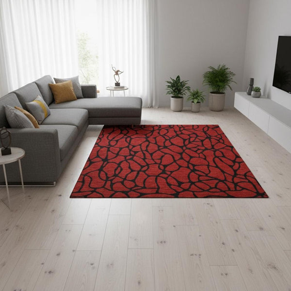 HomeRoots 5' X 8' Red and Black Geometric Area Rug - Washable, UV Protected, Stain Resistant for Modern Living 680363