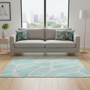 HomeRoots 5' Aqua & Ivory Geometric Washable Area Rug - Stain Resistant, UV Protected, Perfect for High-Traffic Rooms 680369