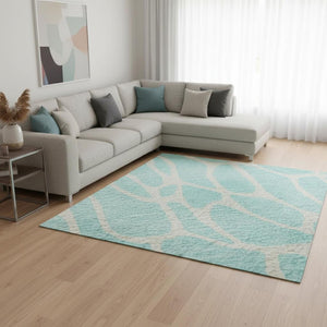 HomeRoots 9' X 12' Stylish Aqua & Ivory Geometric Washable Area Rug with UV Protection for Modern Spaces 680372