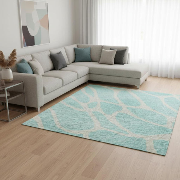 HomeRoots 9' X 12' Stylish Aqua & Ivory Geometric Washable Area Rug with UV Protection for Modern Spaces 680372