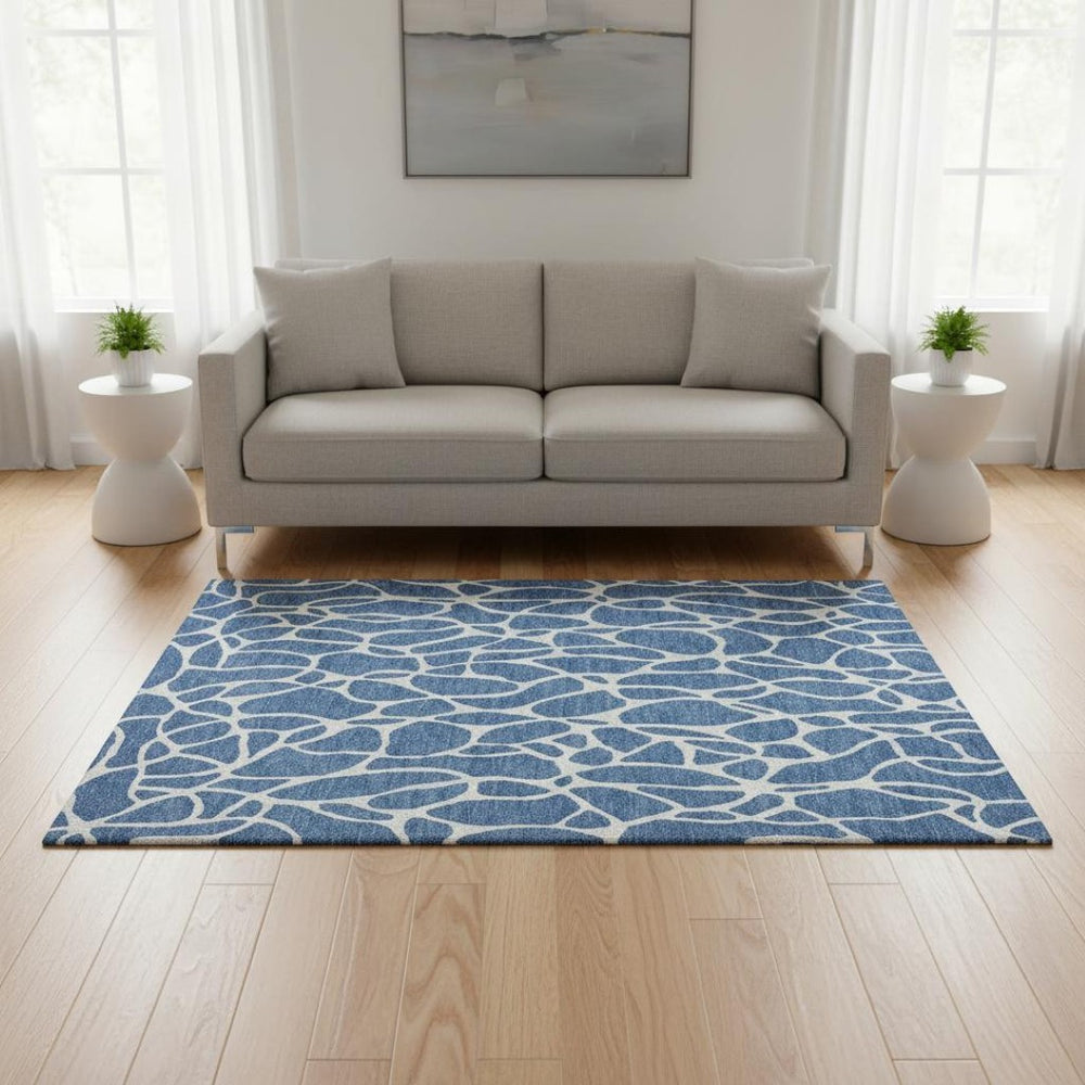 HomeRoots 5' X 8' Blue and Ivory Geometric Area Rug – Durable, Washable, UV Protected for High Traffic Areas 680387
