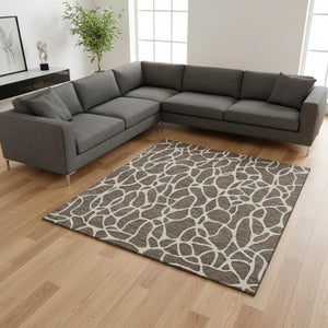HomeRoots 9' X 12' Geometric Washable Area Rug in Brown and Beige - Durable UV-Protected, Stylish & Easy Care 680396