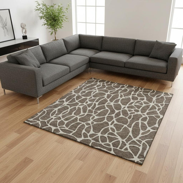 HomeRoots 9' X 12' Geometric Washable Area Rug in Brown and Beige - Durable UV-Protected, Stylish & Easy Care 680396
