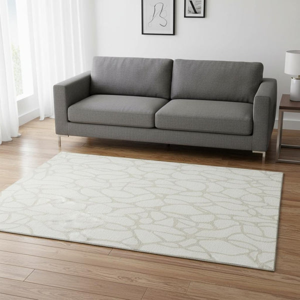 HomeRoots 5' X 8' Ivory & Beige Geometric Area Rug – Durable, Washable, UV Protected for Active Homes! 680417