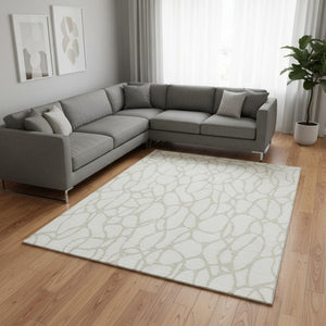 HomeRoots 8' X 10' Ivory and Beige Geometric Area Rug – Washable, UV-Protected, Durable for High-Traffic Rooms 680419