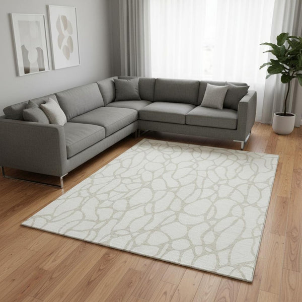 HomeRoots 8' X 10' Ivory and Beige Geometric Area Rug – Washable, UV-Protected, Durable for High-Traffic Rooms 680419