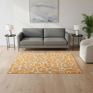 HomeRoots 5' X 8' Vibrant Orange and Ivory Geometric Area Rug - Washable, UV-Protected, Stylish & Durable 680423