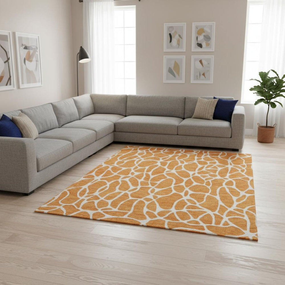 HomeRoots 9' X 12' Orange and Ivory Geometric Area Rug - Durable, Washable, UV-Protected for High-Traffic Spaces 680426