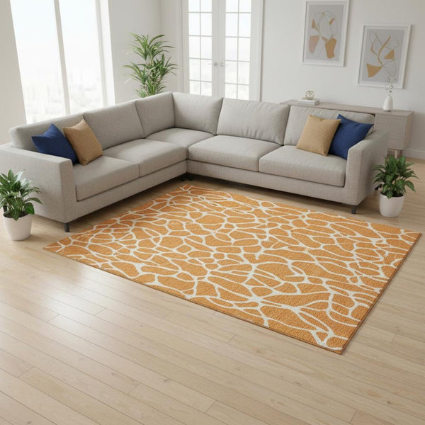 HomeRoots 10' X 14' Modern Orange and Ivory Geometric Washable Area Rug with UV Protection for High Traffic Spaces 680427
