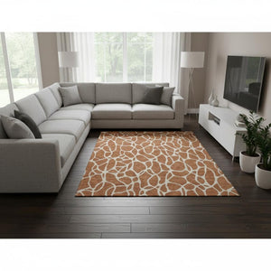 HomeRoots 8' X 10' Geometric Washable Area Rug in Rust and Ivory - UV Protected, Stain Resistant, Durable Design 680431