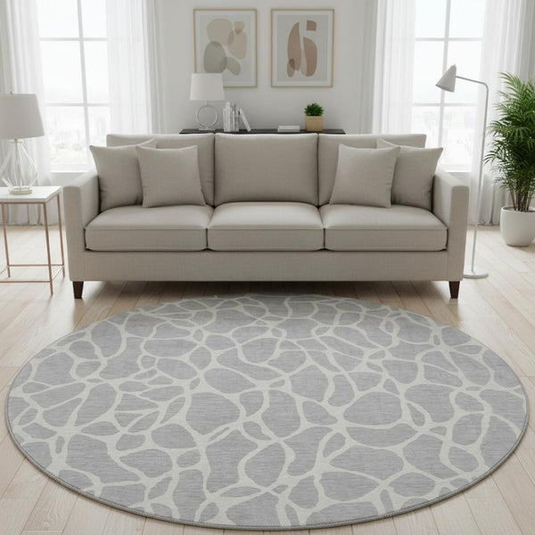 HomeRoots 8' Silver and Ivory Geometric Round Rug - Washable, UV-Protected, Stain-Resistant, Modern Elegance 680436
