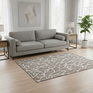 HomeRoots 5' X 8' Taupe and Ivory Geometric Area Rug - Washable, UV Protected, Perfect for Kids & Pets! 680441