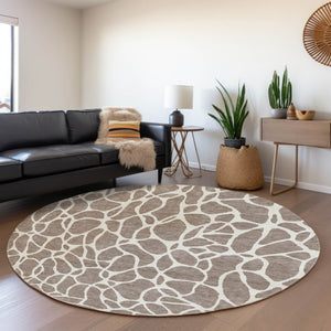HomeRoots 8' Taupe and Ivory Geometric Round Rug - Washable, UV-Protected, Durable Design for Modern Spaces 680442
